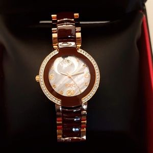 Burgi rose gold and diamond watch